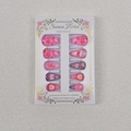 Macro shot of 24pcs Valentine's Day press-on nails with red lip prints and cherry patterns - Dark Red Lip Print Cherry (WY-014)