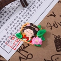 Chinese Tang Dynasty girl figurine tumbler with pink lotus and gold frame window detail - Listening to Wind