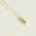 Golden bubble letter J necklace with sparkling cubic zirconia on a delicate fine chain - Letter J