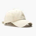 Detail view of the soft cotton twill texture on a beige minimalist baseball cap - Off White