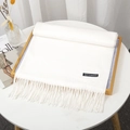 Soft white cashmere-feel winter scarf with elegant tassel edges and classic label - Pure White