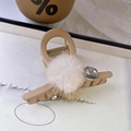 Detail of beige matte claw clip decorated with white fur ball and grey crystals - Plush Style / Small 8cm / Khaki