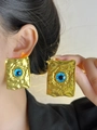 Macro detail of vintage gold square earrings with blue evil eye resin inlay - Gold Blue Eye Square Earrings