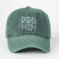 Detailed texture of washed green cotton baseball cap with DOG MOM print and paw icon - One Size / High Crown Dark Green
