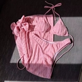 Three-piece pink bikini set with halter top and matching sarong in ribbed hollow fabric - Pink