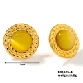 Detail view of 2cm vintage candy color stone stud earrings with golden braided frame - Yellow/Cat's Eye