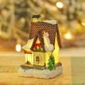 Nordic Christmas resin cabin with warm LED lights and snow effect for tabletop decor - Model F Small House