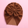 Detailed top view of dark brown baby hat featuring a large 3D bow on pink background - 18*21cm / Coffee