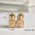 Set di due decorazioni natalizie a forma di gufo dorato con glitter su pizzo bianco - Gufo Dorato Set da 2