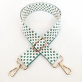 Detail of adjustable woven purse strap with teal cross pattern and gold metal hardware - Silver Buckle/Cross Woven / Style A Green