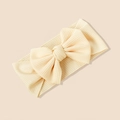 Beige ribbed knit baby headband with large bow, highly elastic hair accessory for girls - Cream
