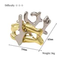 Casse-tête en métal doré et argenté pour enfants, dimensions 54x60mm, 56g - Corail