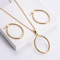 Minimalistisches vergoldetes Edelstahlschmuckset mit ovalem Anhänger und Ohrringen - Eiförmiges Set (Gold)