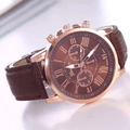 Detailed macro view of Geneva quartz watch with rose gold case and brown leather strap - Brown