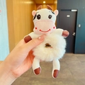 Chouchou peluche vache mignon en fausse fourrure blanche avec cornes brunes enfant - Chouchou Peluche Vache
