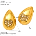 Macro detail of 18K gold plated teardrop earrings with heart pearl inlays and 25mm size - Waterdrop Shape Pearl Heart Style (SE528G)