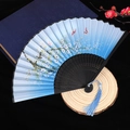 Elegant blue gradient folding fan with flower and butterfly patterns and a silk tassel - No. 47