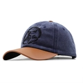Detail of blue denim baseball cap with brown leather brim and embroidered star logo - Navy Blue Patchwork (JX-39527藏青)