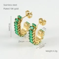 Macro detail of 18K gold plated C-hoop earrings with green zircon and size specs - Gold with Green Zirconia