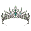 Detailed close-up of green crystal crown with emerald teardrop stones on dark metal - Gun Black/Green/White