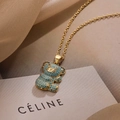 Collana con ciondolo a orsetto placcata in oro con zirconi turchesi su seta beige - Orsetto con Strass Celeste (23870)