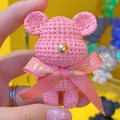 Pink resin bear keychain with knitted texture and decorative gold-stamped ribbon - Single Doll / Pink