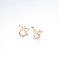 Macro shot of minimalist gold stainless steel heartbeat studs with reflective mirror finish - 086 ECG / Gold