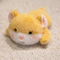 Cute orange and white plush hamster magnet in a lying pose with fluffy soft fur texture - Shiba Inu
