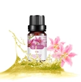 Organic lily plant essential oil in 10ml amber bottle with golden liquid splash - Lily (single)