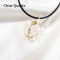 Collana stella Merkaba in cristallo bianco avvolto in filo dorato con cordino nero - Cristallo di rocca