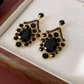Macro detail of vintage teardrop earrings with black gemstones in gold metal setting - Luxury Teardrop Black Stone Style (8# Silver Pin)