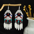Bohemian silver drop earrings with colorful beads and feather-shaped tassel charms - Colorful