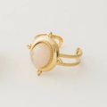 Detail of vintage gold-plated ring with oval pink stone and adjustable beaded band - Adjustable Open / Pink