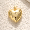 Detail view of 18K gold heart pendant with leopard pattern and sparkling crystals - Gold Micro-set Heart