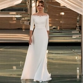 Elegant off-shoulder white wedding gown with lace appliques and stylish 3/4 sleeves - US size 2 (S) / Ivory