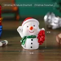 Mini Christmas snowman figurine with red hat and green scarf resin tabletop decoration - Snowman - Boxed