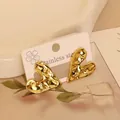 Golden heart-shaped stainless steel stud earrings with a unique hammered texture finish - Gold Pleated Heart (1)