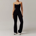 Schwarzer Yoga-Jumpsuit mit Rückenkreuz, weißem Besatz und ausgestelltem Bein - S / Premium Schwarz
