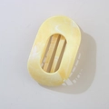 Elegant oval-shaped hair claw clip with yellow marble texture and internal comb teeth - Bulk Packaging / Oval Clip / Dark Yellow