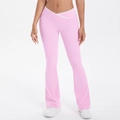 Detail of pink high-waisted flare yoga pants with V-shaped white contrast cross waist - Sakura Pink