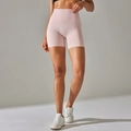High-waisted light pink yoga shorts for women with breathable nude-feel fabric - Light Pink