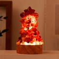 Christmas tree crystal lamp with red stones and round wooden base glowing in warm light - Red Agate Lamp