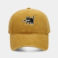 Detailed close-up of a vintage mustard yellow cotton baseball cap with black cat knife embroidery - Adjustable / Yellow