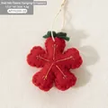 Handmade red felt flower Christmas ornament with yellow embroidery and jute string - Red Snowflake