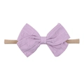 Detail of purple jacquard bow headband for infants with high elasticity nylon band - Purple