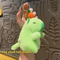 Plush capybara keychain with green swimming ring and orange fruit head accessory - Pull String Orange Capybara Green