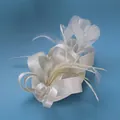Detail of elegant cream fascinator hat featuring satin bows and delicate feathers - Off White