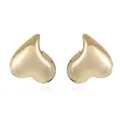 Macro shot of mirror-polished gold-plated teardrop earrings with elegant reflections - Style 3 Gold