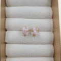 Four-prong rose quartz stud earrings with gold plating in a beige jewelry box - Pink Opal