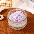 Lavender rose scented candle in embossed glass jar on a cozy wooden tray - Purple Rose Shape